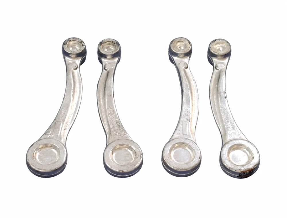 Custom Aluminium forging parts on a white background Custom Aluminium forging parts on a white background