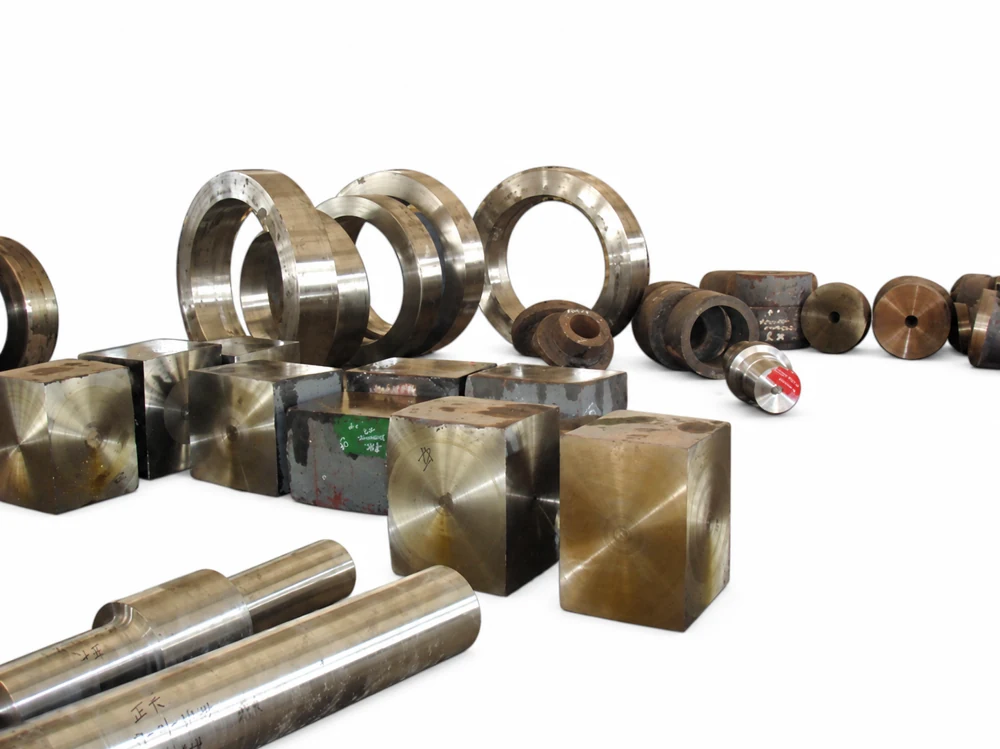 Open die forging-all types of forging parts on a white background Open die forging-all types of forging parts on a white background